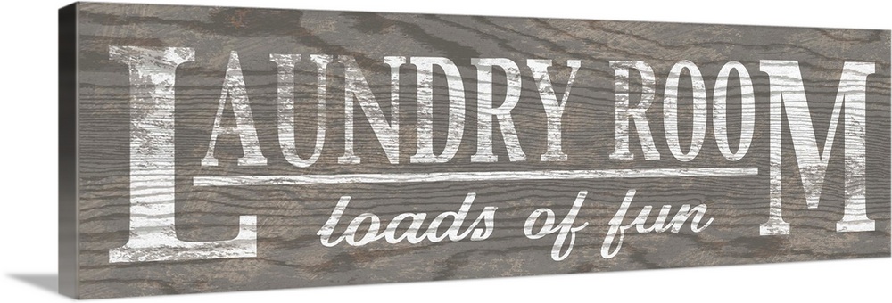 "Laundry Room Loads of Fun" faux gray wooden sign with white text.