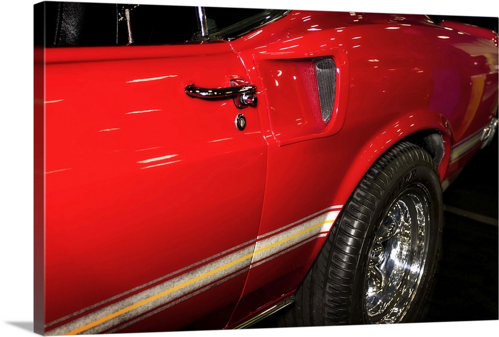 Fine art photograph of the door and back wheel of a vintage car.