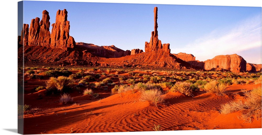 The bright red sands and rock formations of Monument Valley, Arizona.