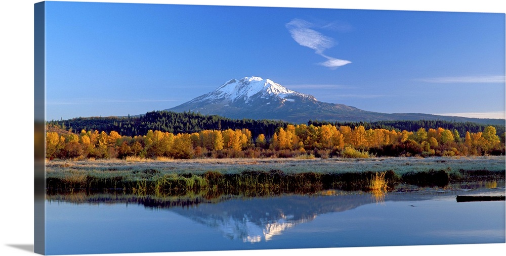 View of the peak of Mount Adams in Washington, reflected in the water.