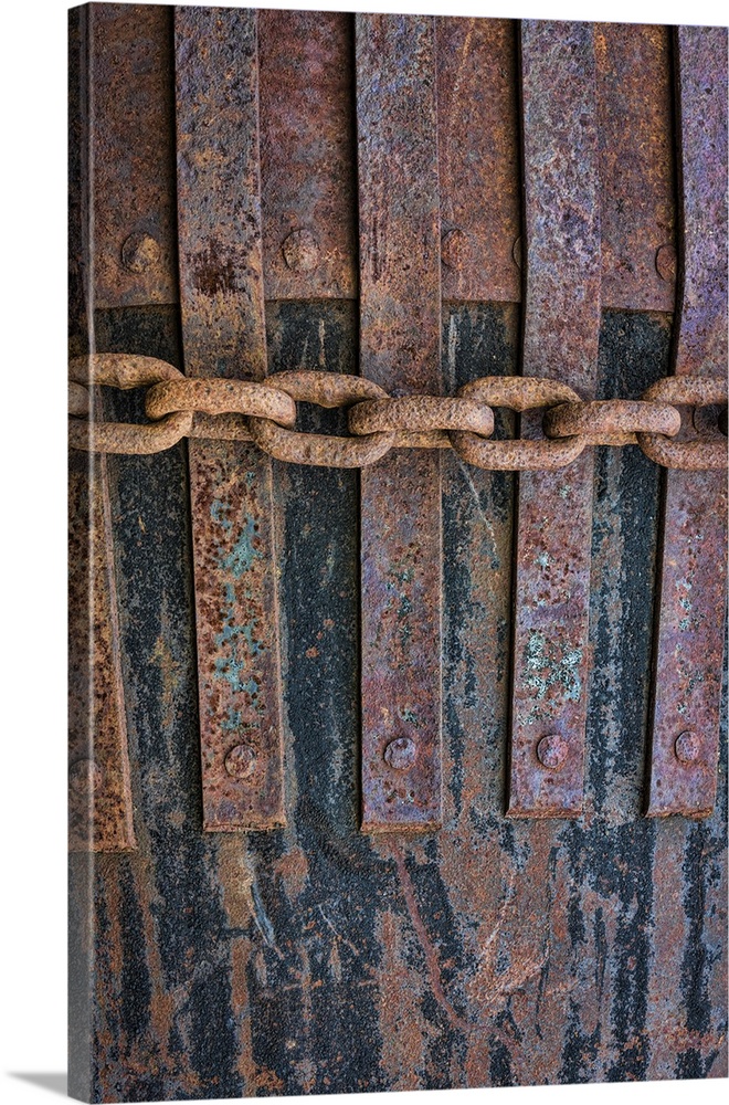 A close up photo of metal elements that have rusted over time.