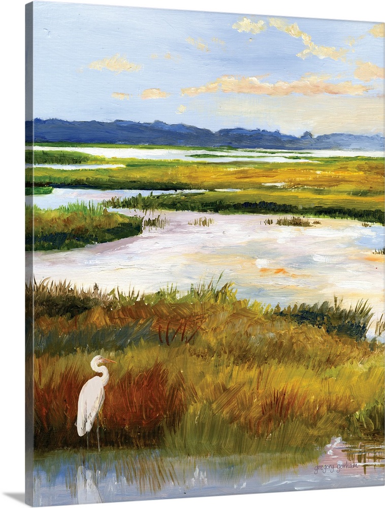 A serene scene of water and grasses illuminated by the late afternoon sun. A white heron stands patiently in the corner. T...