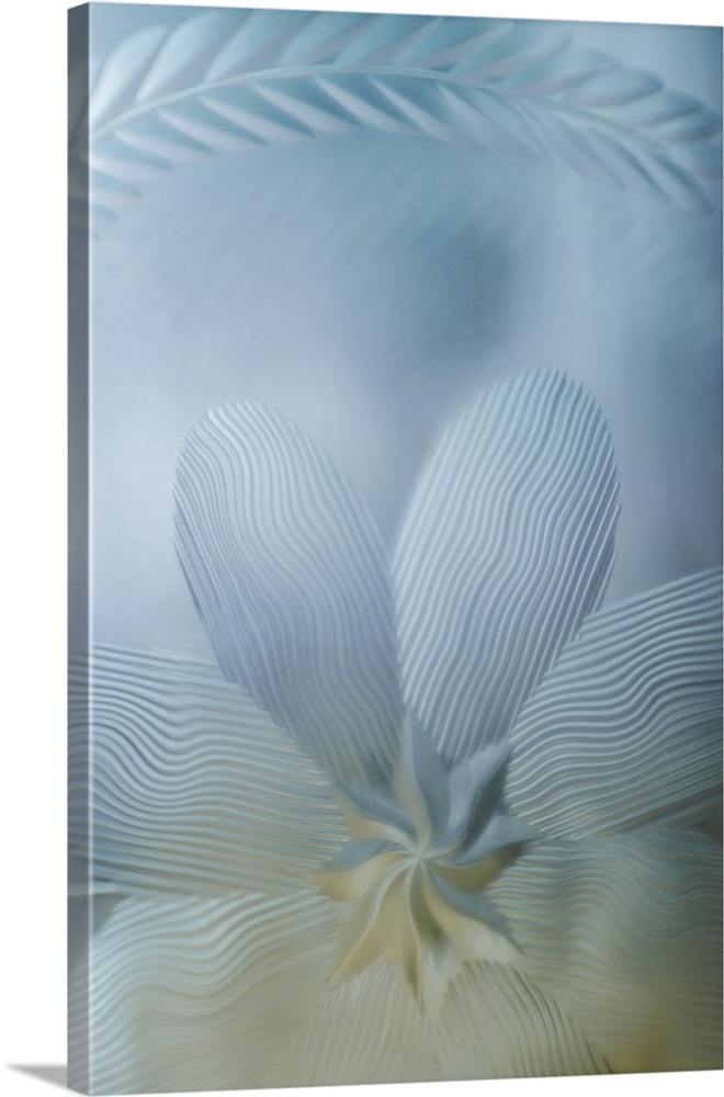 Three leaves with flower in pale blue.