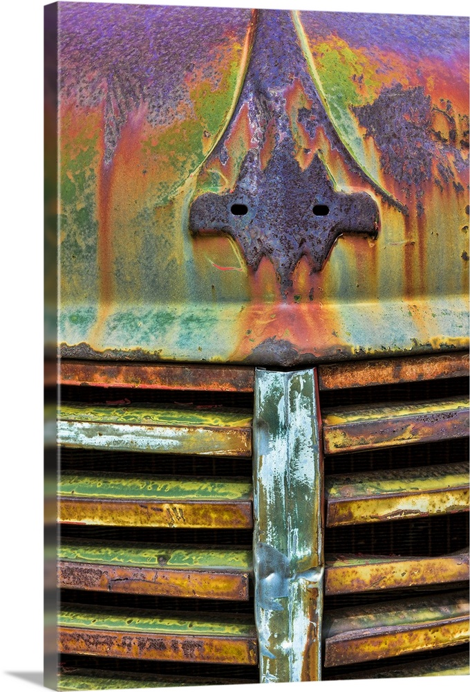 A close up photo of weathered old parts of a vintage truck.