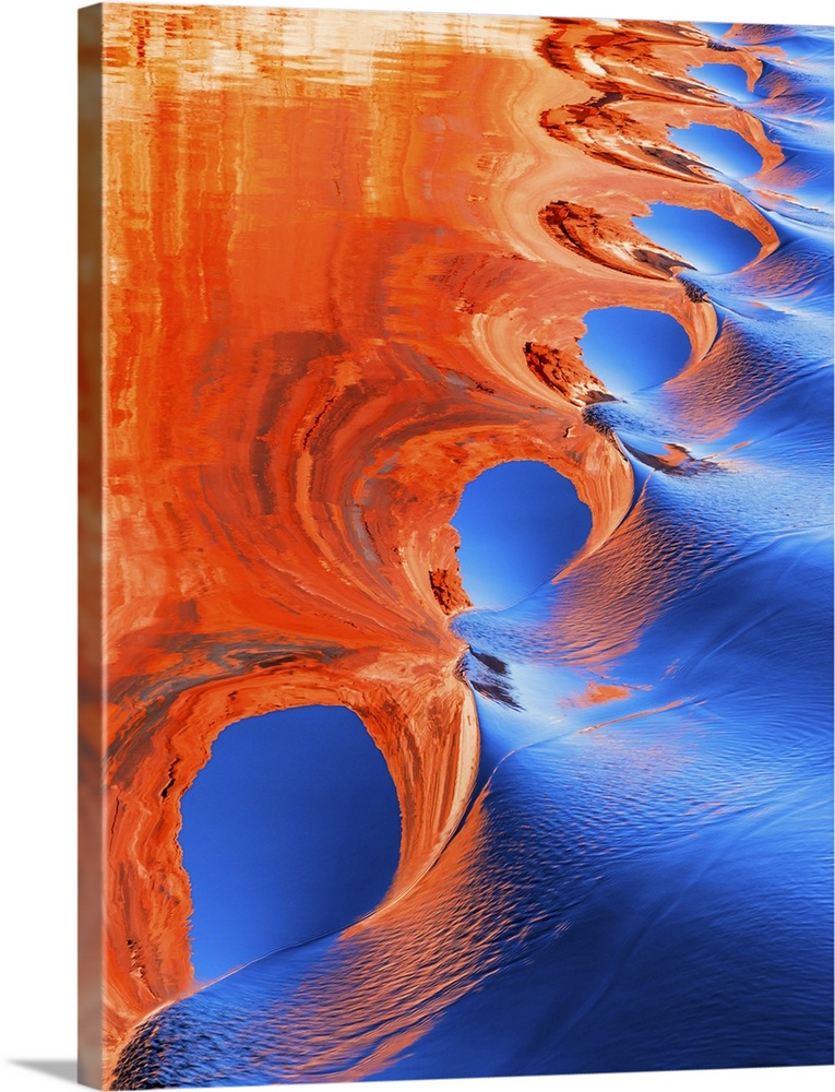 An abstract photograph created by natural reflections in rippling water.