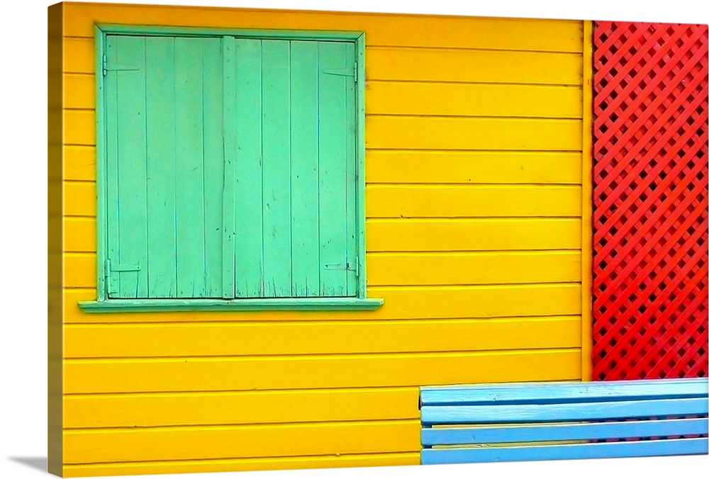 Landscape photograph on a big canvas of a vibrant space of Caminito in La Boca, in Buenos Aires, showing a window with gre...