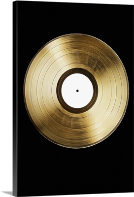 A gold record on a black background