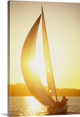 A sailing-boat at sunset Baltic sea.