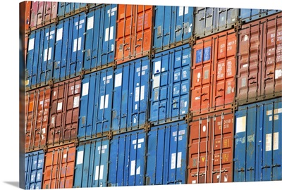 A stack of cargo containers, commercial freight containers