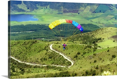 Aerial view of a person paragliding