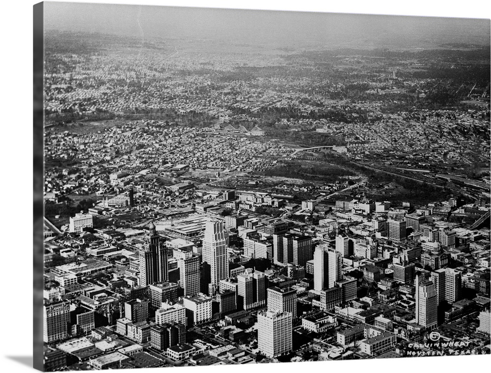 The growth of Houston, Texas...A general view of Houston, Texas, taken from the air, showing the large buildings of the bu...