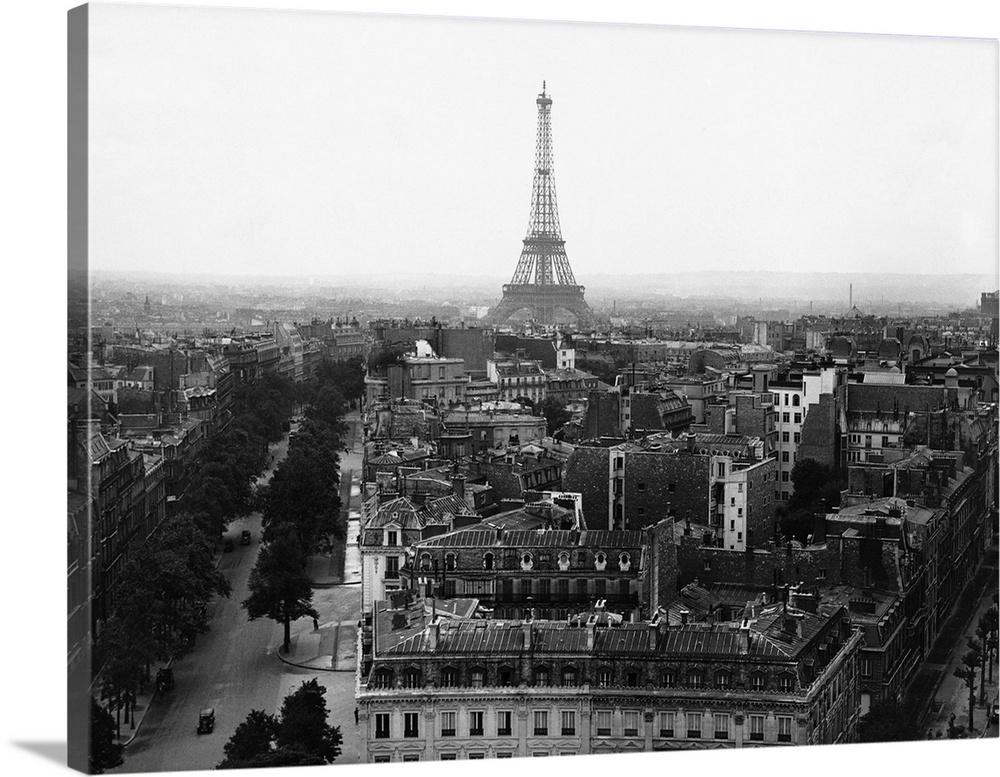 View of the Eiffel Tower and surrounding buildings, taken from the top of the Arc de Triomphe.