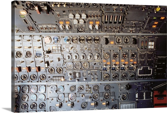 What are some of the controls in a plane cockpit?