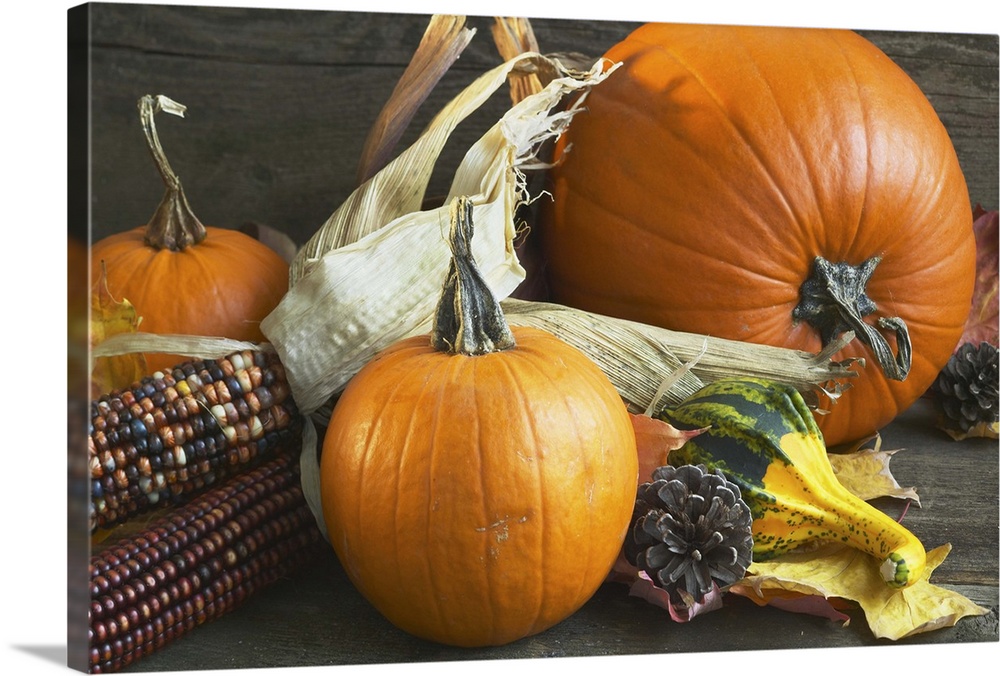 An autumn arrangement of corn and pumpkins