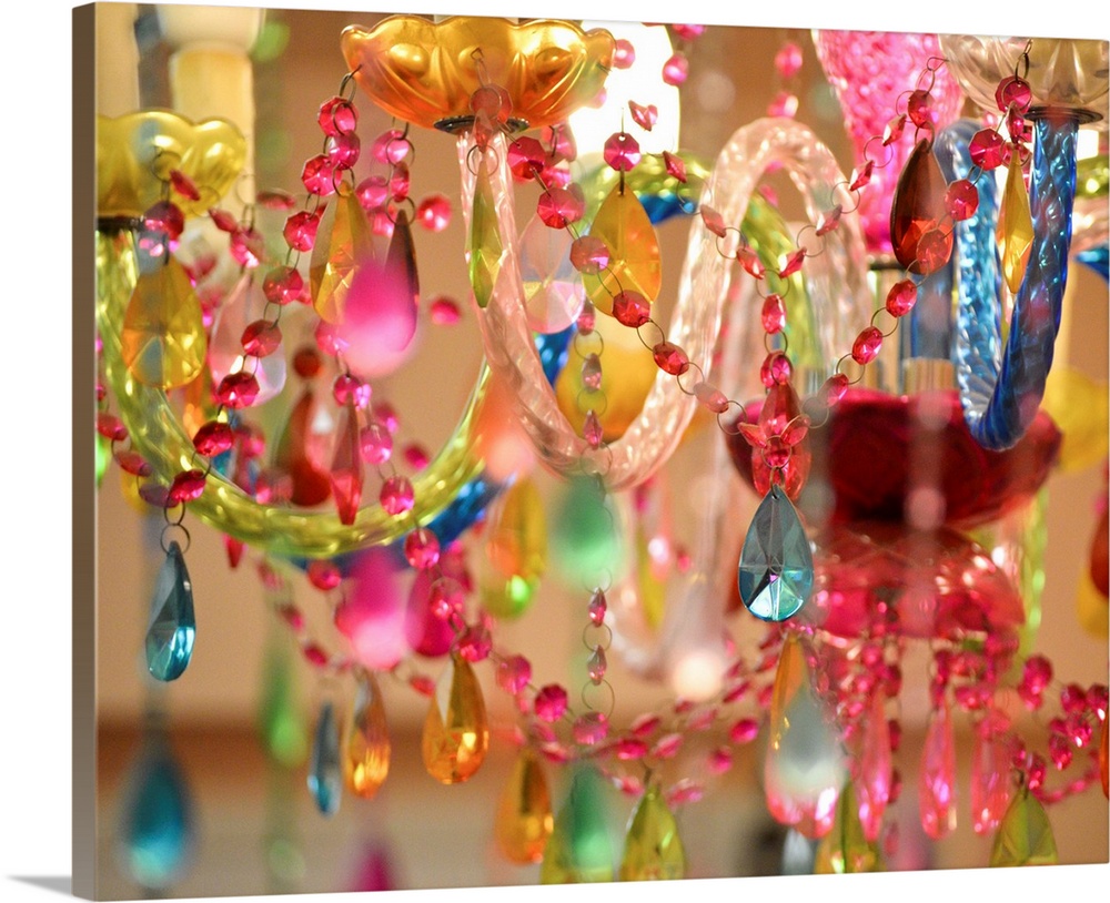 Closeup of chandelier made out of colorful glass and glass pearls.