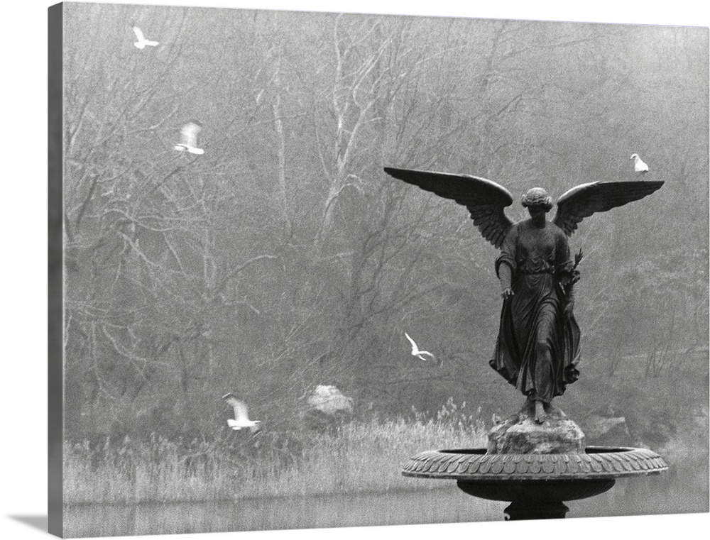 Angel Sculpture in Pond