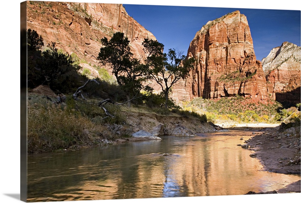 Angels Landing reflected in the waters of the Virgin River, Zion National Park, Utah. USA