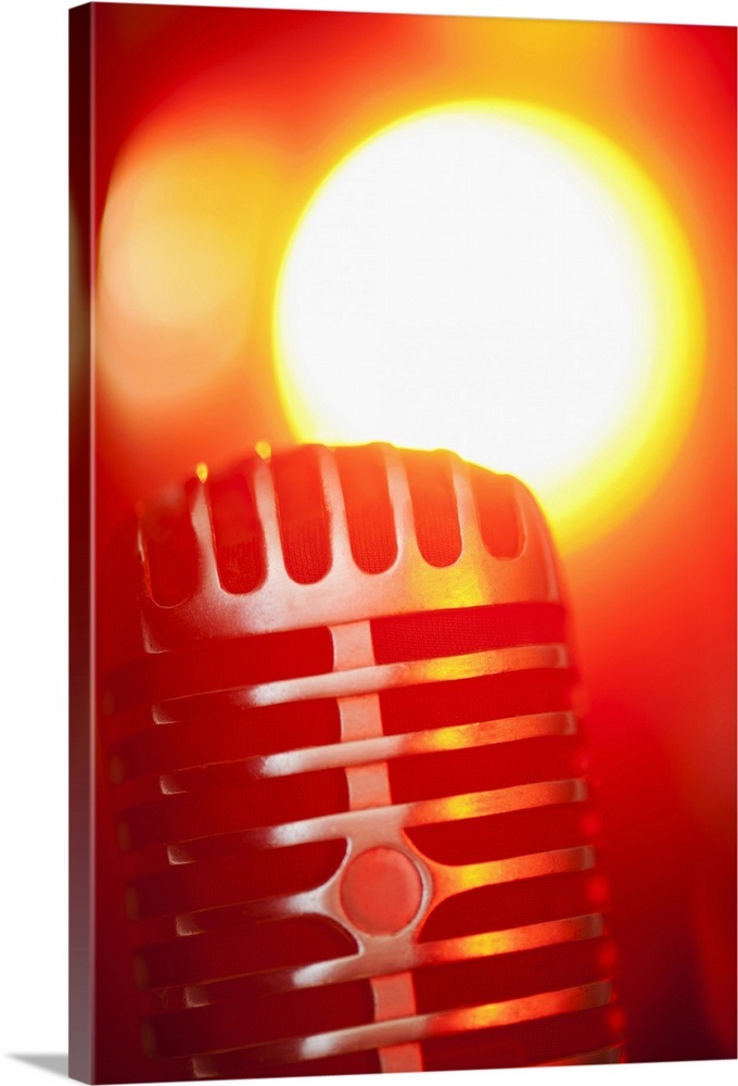 Antique microphone in spotlight Wall Art, Canvas Prints, Framed Prints