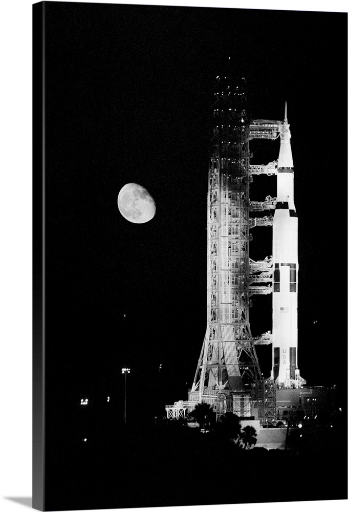 Kennedy Space Center, Fla. Mounted atop a Saturn 5 rocket, the Apollo 11 spacecraft in which Neil Armstrong and Buzz Aldri...