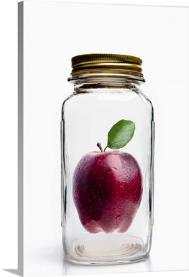 Apple in glass mason jar