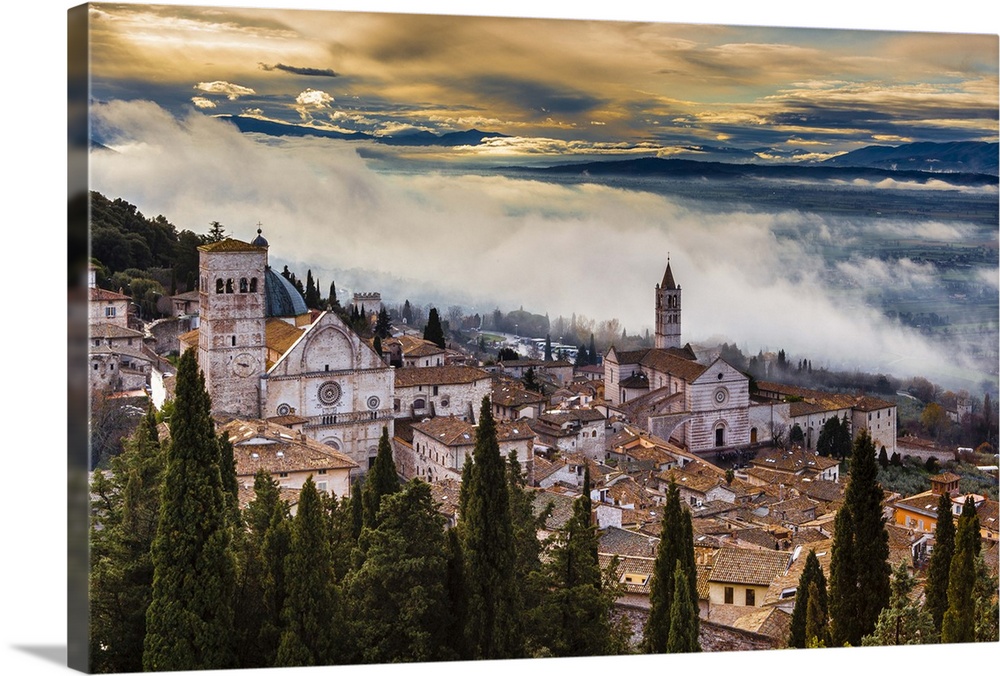 Assisi Cathedral or Cathedral of San Rufino of Assisi (left) and Basilica di Santa Chiara or Basilica of Saint Clare at su...