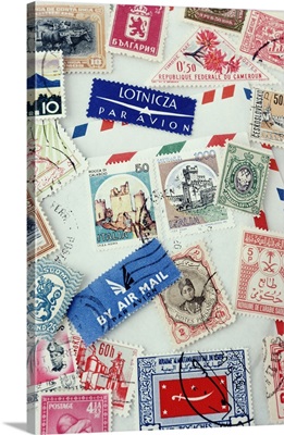 Assorted stamps from various countries, overhead view