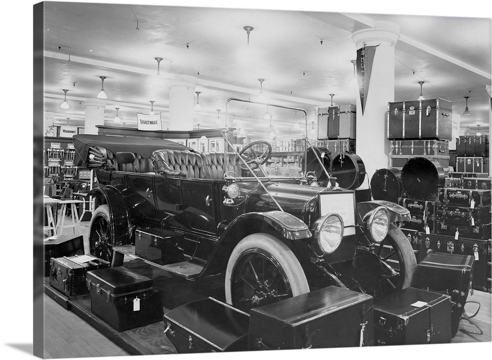 448-60 watt General Electric Mazda lamps illuminate the automobile department inside Gimbel's Department Store.