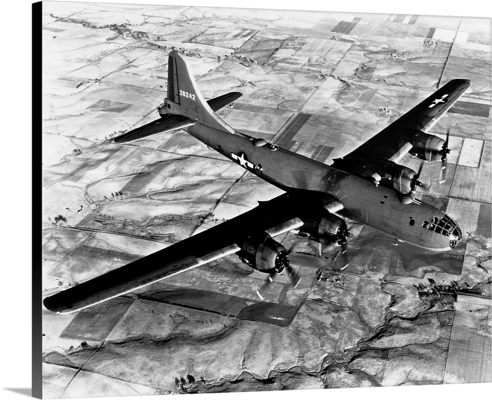 Aerial view of a B-29 flying over Japanese fields.