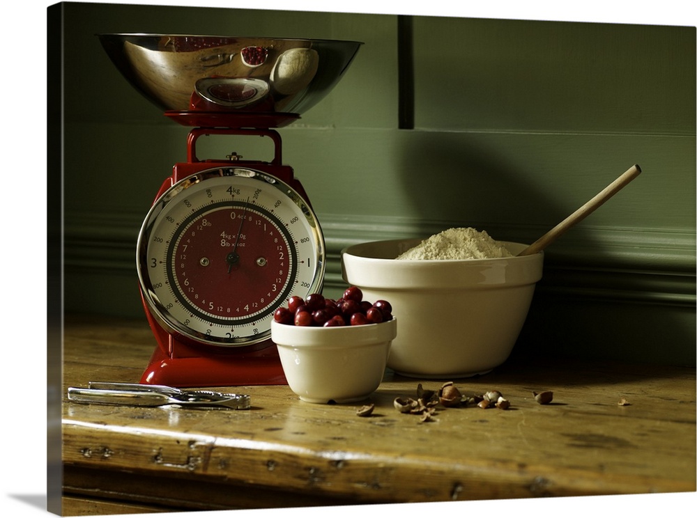Photograph of flour, cherries, and scale for measuring food.