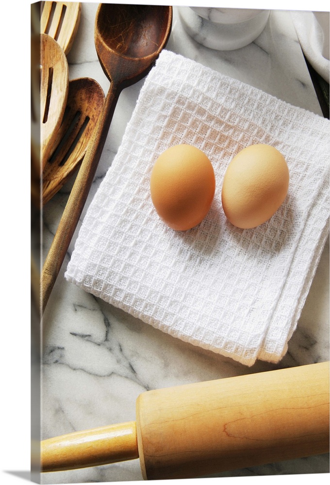 Baking tools and egg on napkin