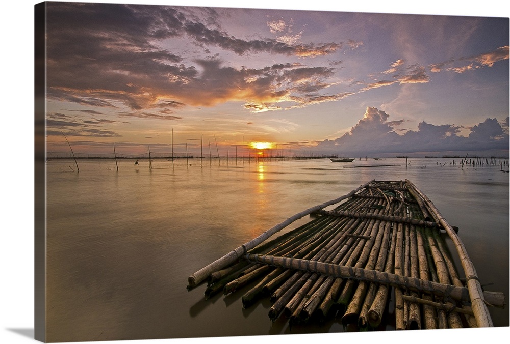 Bamboo raft at sunset.