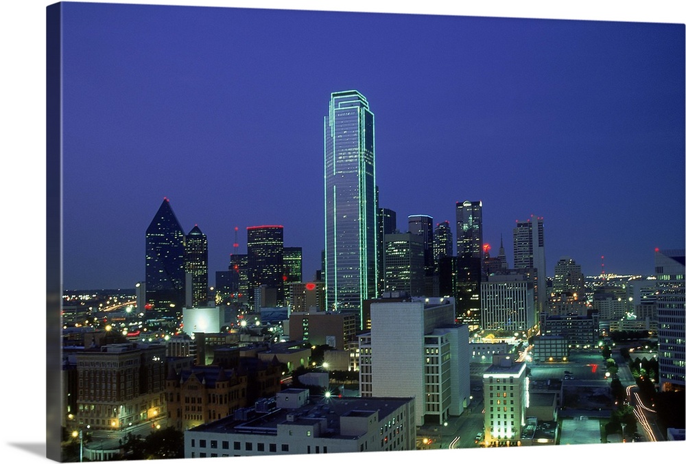 Bank of America outlined in green neon at dusk, Dallas, TX