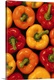 image thumbnail of Overhead shot of a group of three varieties of freshly picked bell peppers in summer colors.