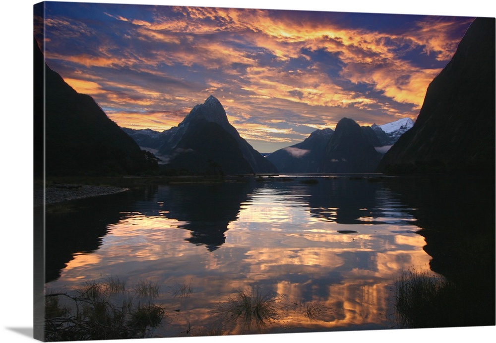 Milford Sound, New Zealand at sunset after a rain storm.  A wider and brighter version of a photo I uploaded a few months ...