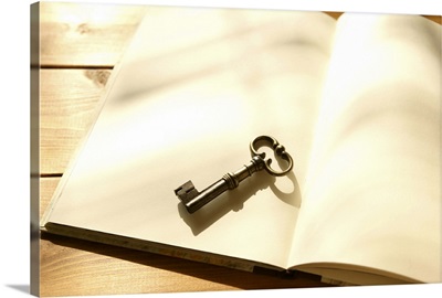 Blank note pad and antique key