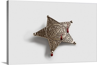 Bloodstained sheriff's badge