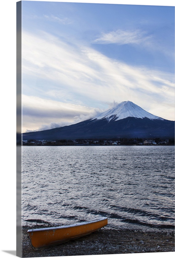 boat by kawaguchi lake with a sunrise view of mount fuji at fuji five lakes (fuji goko)