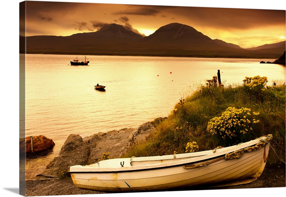 Boat on the shore at sunset, Island of Islay, Scotland