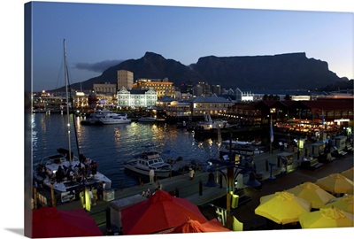 Boats in the harbor and Table Mountain in South Africa