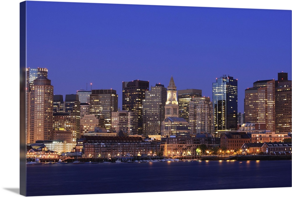 Boston Harbor and skyline.  Boston is one of the oldest cities in the United States and largest city in new England.  It h...
