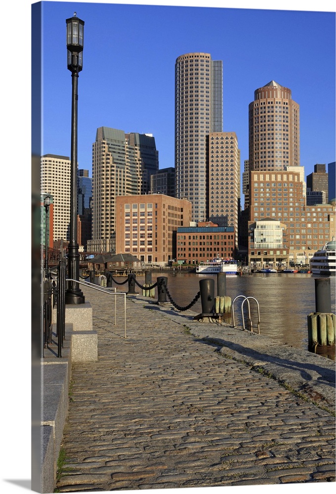 Boston Harbor and skyline.  Boston is one of the oldest cities in the United States and largest city in new England.  It h...