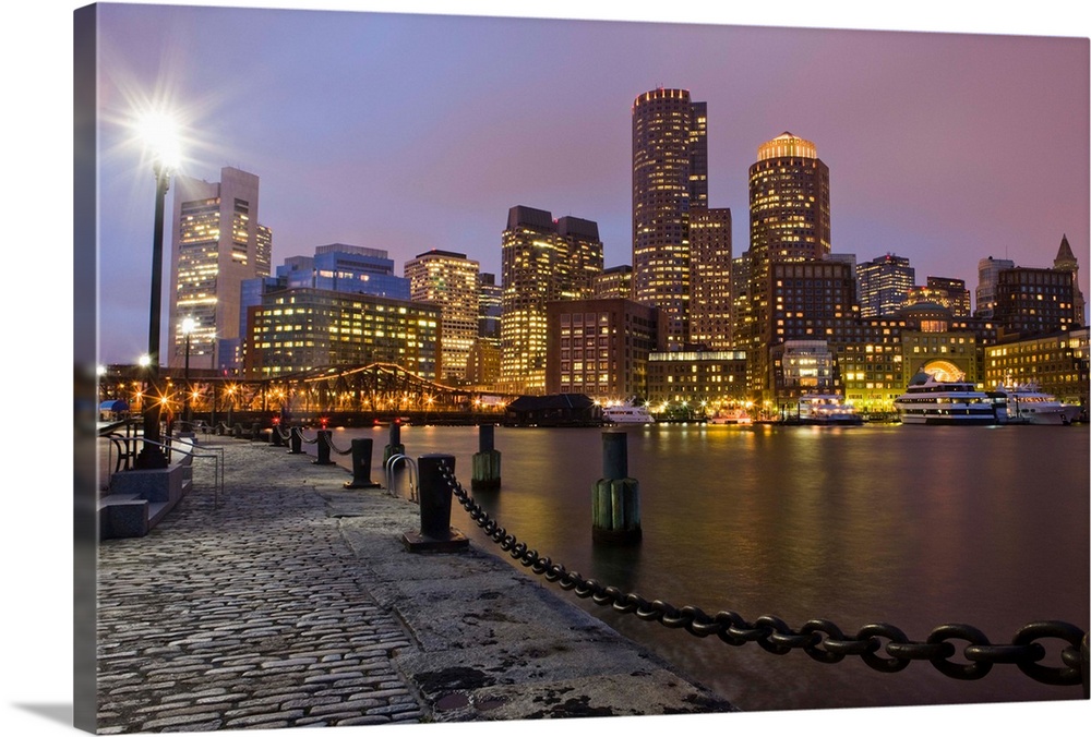 Quayside view across the Inner Harbor to the financial District at night