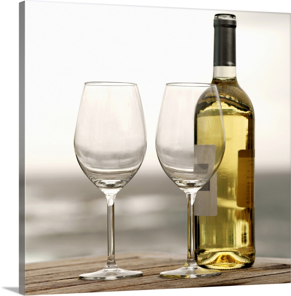https://static.greatbigcanvas.com/images/singlecanvas_thick_none/getty-images/bottle-of-white-wine-and-two-glasses,1002430.jpg