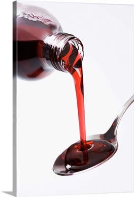 Bottle pouring spoon of cough syrup