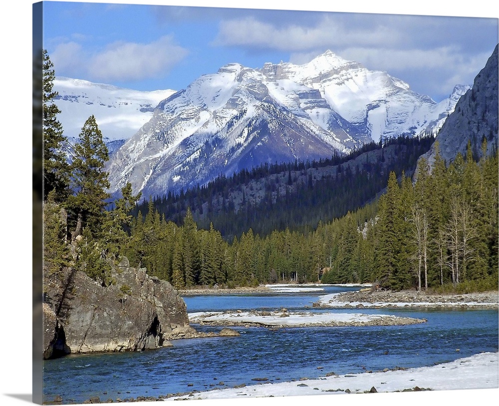 Beautiful Bow River heads east winding through Banff Springs Golf Course, Banff National Park, Alberta, Canada.