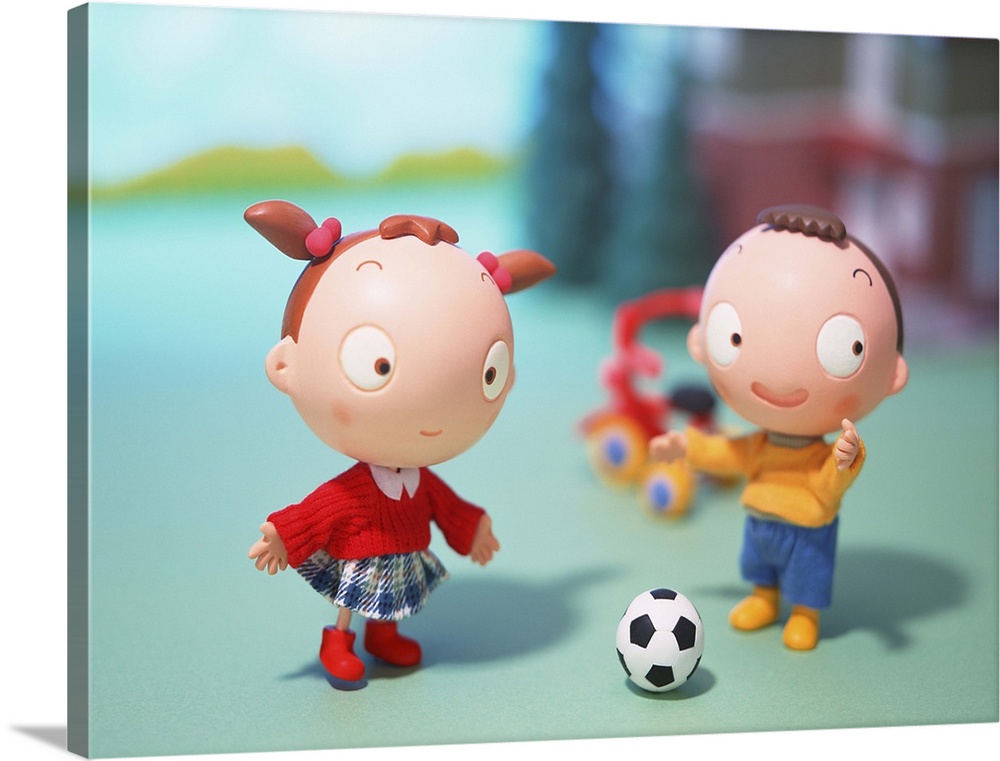 Boy and Girl playing soccer
