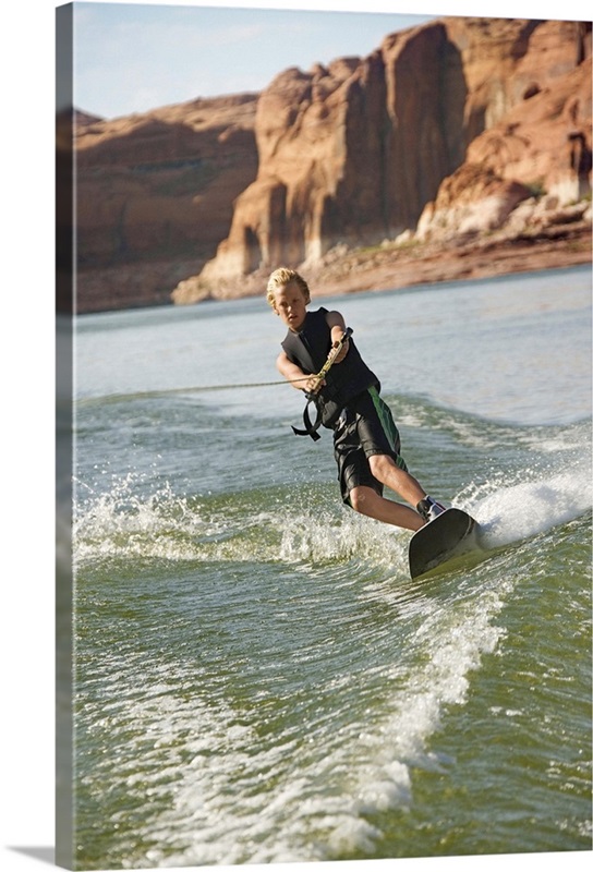 Boy wakeboarding on Lake Powell | Great Big Canvas