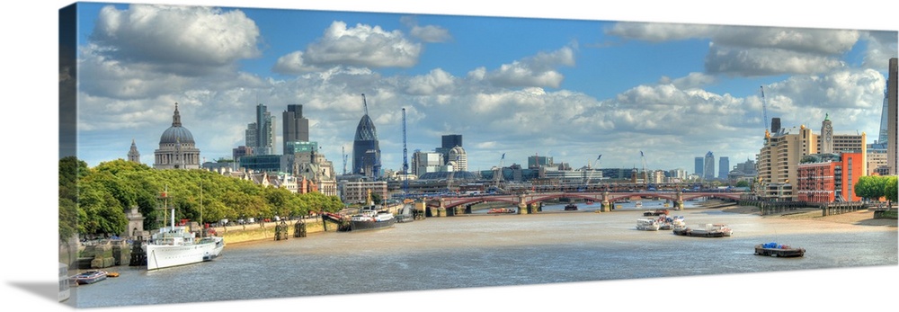 Bridge over River Thames and St Paul's Cathedral in London.