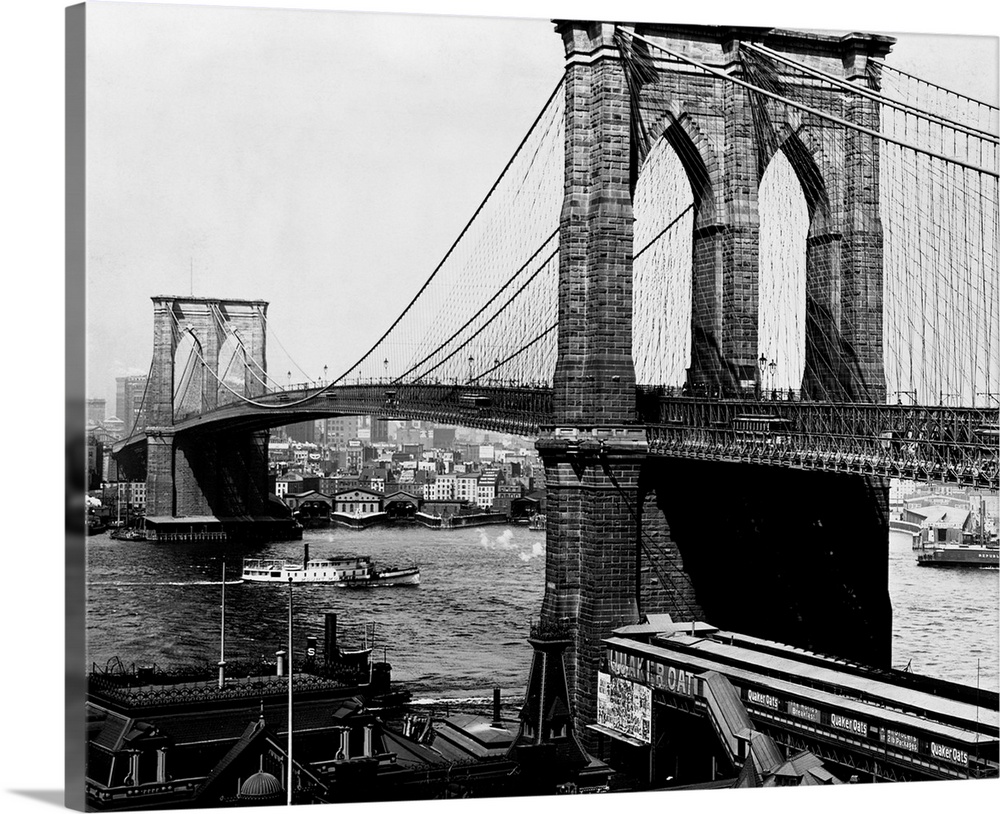 A view of the Brooklyn Bridge, an engineering feat. When the bridge was completed in 1883, it was the largest suspension b...