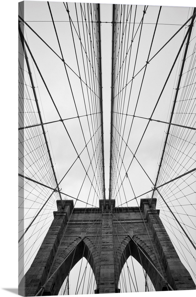 USA, New York, New York City, Converging lines of suspension cables and massive tower on Brooklyn Bridge